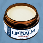 Jar of unscented lip balm with a blue background